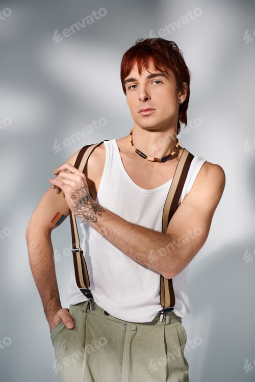 Preview: Vibrant redhead rocking suspenders