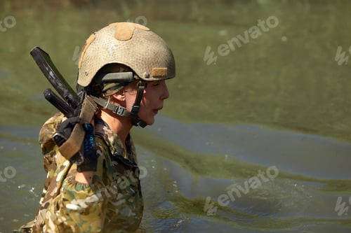 Preview: Special forces soldier with weapon take part in military maneuver. War, army, technology and people