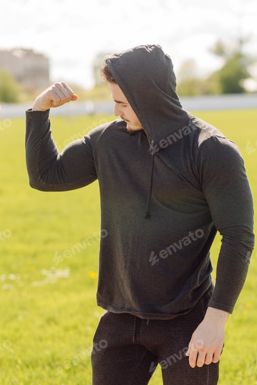 Preview: Male athlete doing fitness training. Workout outside the gym.