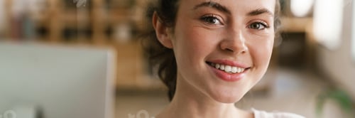 Preview: Close up of a young brunette woman casually dressed