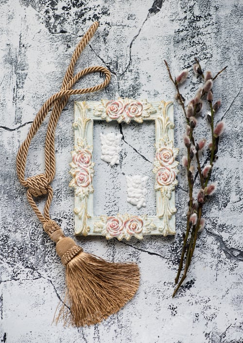 Preview: Easter background with frame, angels, decorations and flowers.