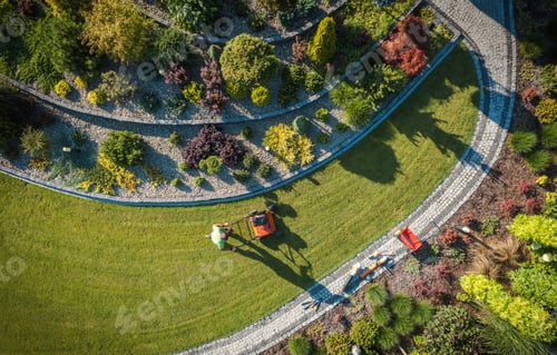 Preview: Aerial View of Professional Garden Worker with Push Spreader