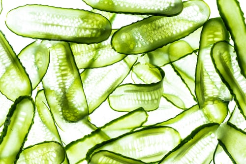 Preview: Sliced Farm Fresh Cucumber. Food Background on White. Abstract Pattern