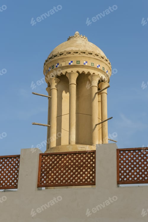 Preview: Architectural Tower Rising Against Clear Blue Sky