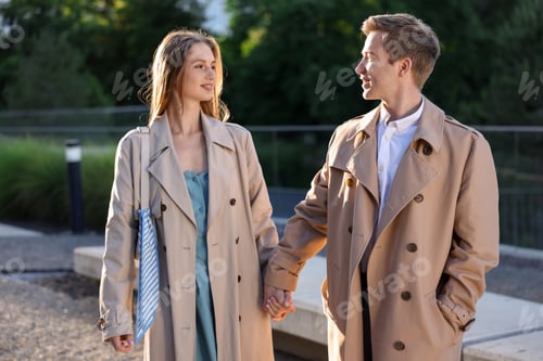 Preview: Lovely couple walking together on city street