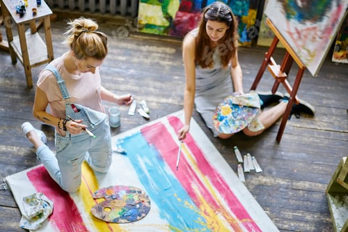 Preview: Caucasian friends discussing masterpiece