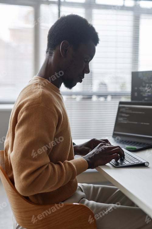 Preview: Programmer writing codes for software