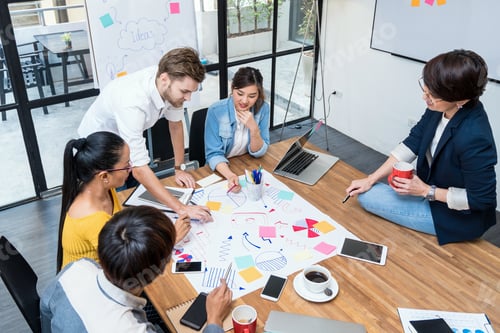 Preview: Group Of Asian and Multiethnic Business people with casual suit working and brainstorming