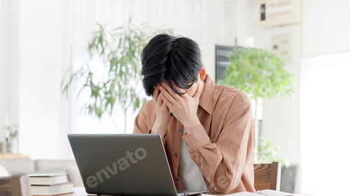 Preview: Man having trouble with computer