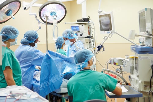 Preview: Surgical Team Working In Operating Theatre