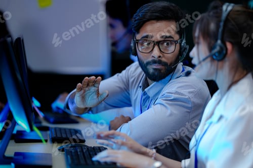 Preview: A diverse team of professionals works at a customer support call center