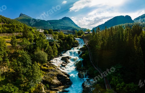 Preview: View of the river Geirangerelvi and the waterfall Storfossen in Geiranger, Norway.