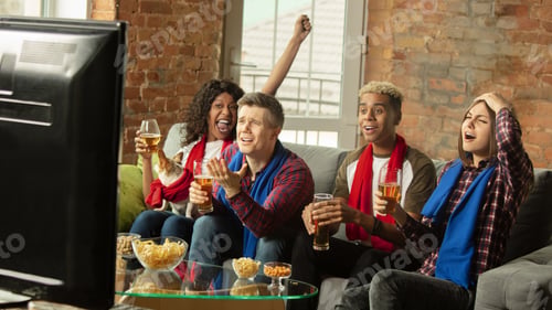 Preview: Excited group of people watching sport match, championship at home
