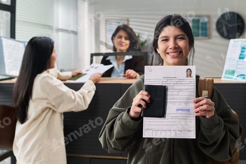 Preview: Portrait of Woman Smiling While Holding Approved Visa Application Form