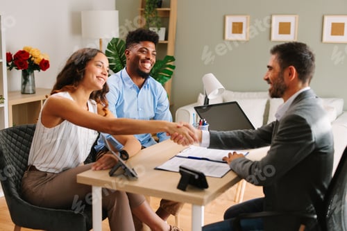 Preview: Young Latin American couple makes a deal with an agent in the office and does handshake