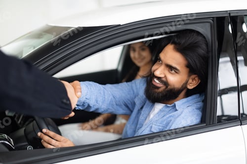 Preview: Man shaking hands with a car salesman