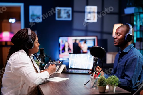 Preview: Interviewer doing radio broadcast