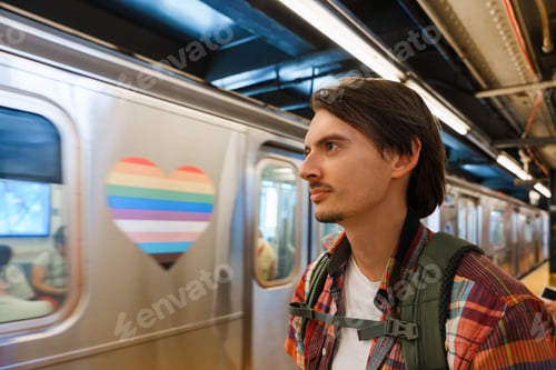 Preview: Man Waiting Beside Metro Train With Pride Heart