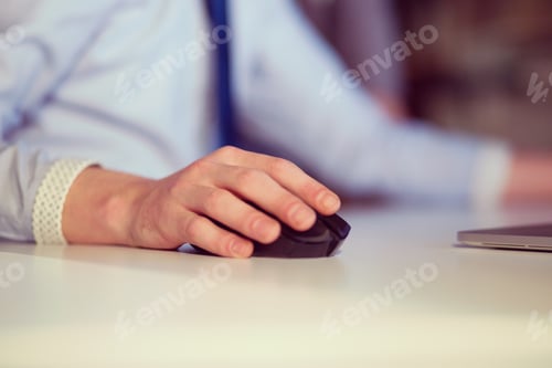 Preview: Hand using computer mouse closeup