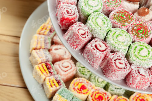 Preview: Turkish delight on a wooden table.