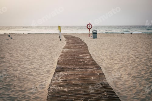 Preview: Desolate beach in winter season with nobody there - off vacation time with ocean and sand
