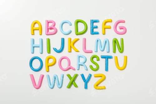 Preview: Alphabet made of colored plasticine on a light background.