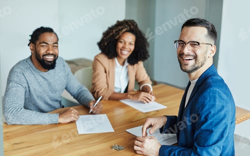 Preview: Young couple with a real estate agent meeting