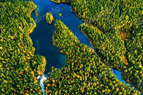 Preview: Aerial drone view of blue winding river in fall autumn color forest in Finland Lapland