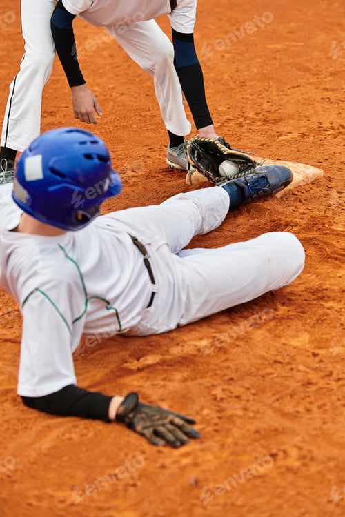Preview: Two energetic teenage boys engage in a lively baseball game on a bright, sunlit field