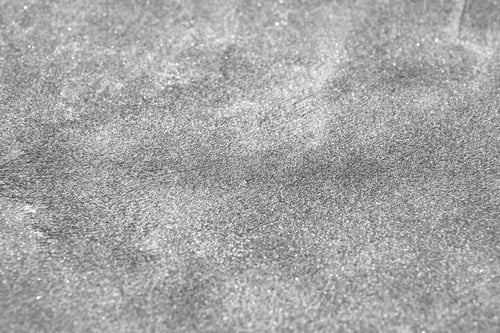 Preview: Concrete rough background. Street ceramic product. Ground stone table