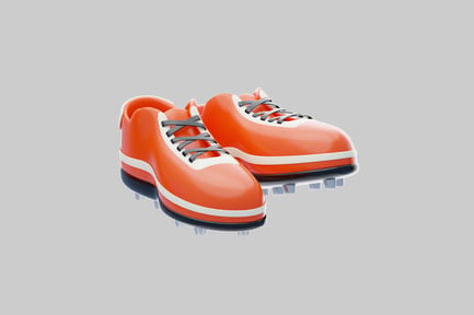 Preview: Orange football cleats pair