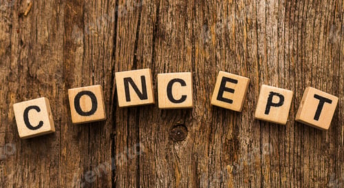 Wooden Blocks Spelling Concept on Wood Background