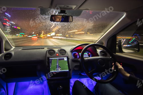 Preview: The man drive vehicle in the city highway. Left side traffic. Evening night time