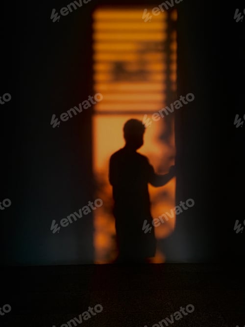 Preview: Warm light with the shadow of a man