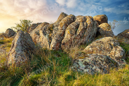 Preview: Huge deposits of stone minerals in a clearing bathed in warm sun