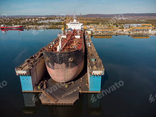 Preview: aerial view shipyard dry dock maintenance and repair cargo ship transport and oil ships in sea