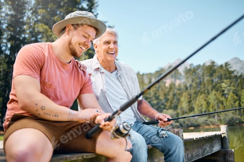 Preview: Shot of a man fishing with his father at a lake in a forest
