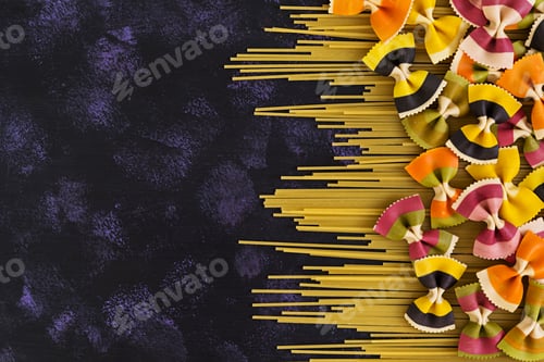 Preview: Mixed colorful farfalle pasta. Flat lay. Top view.