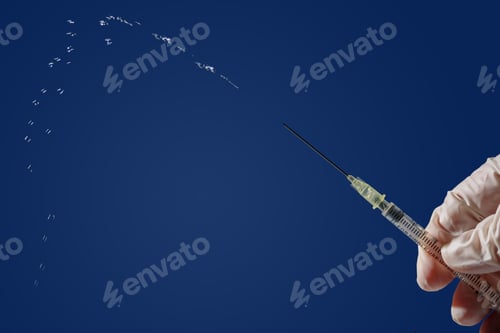Preview: Insulin syringe in hand