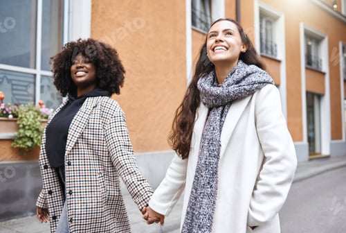Preview: Woman, friends and holding hands walking in the city for friendship, travel or fun journey in the o