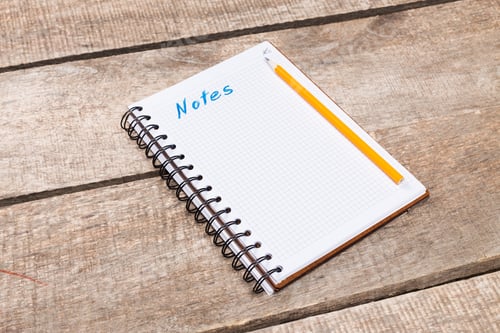 Preview: Blank notebook with pencil resting on wooden surface for taking notes and ideas
