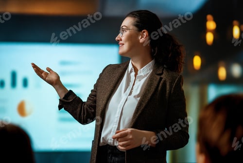 Preview: A woman is speaking on stage