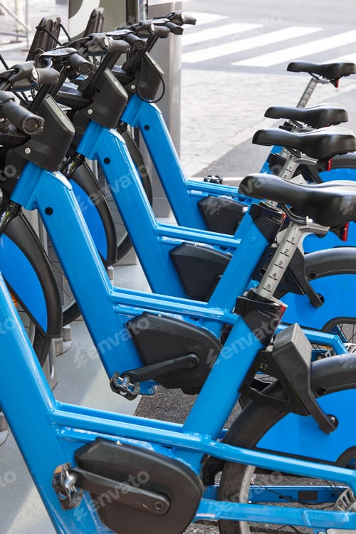 Preview: Charging urban electric battery bikes in the city. Sustainable mobility