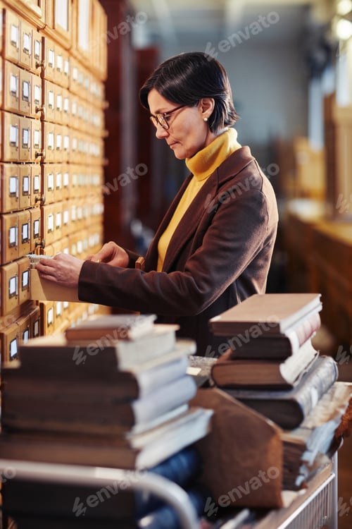Preview: Female Librarian Working