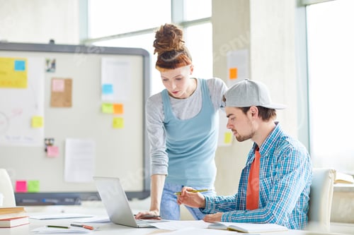 Preview: Busy marketing colleagues working in office
