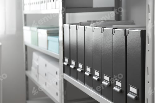 Preview: Folders with documents on shelf in archive