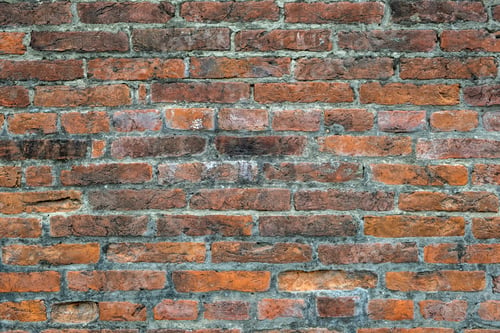 Preview: Weathered old red brick background with rough surface.
