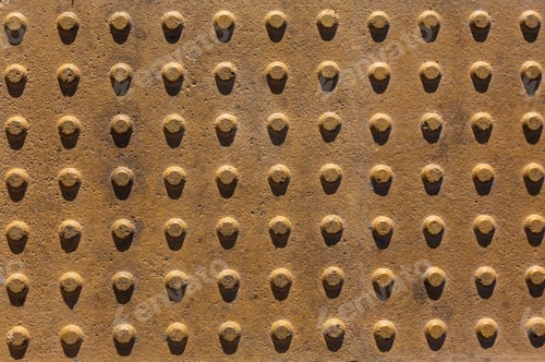 Preview: Close-up of manhole cover of steel with rust as background