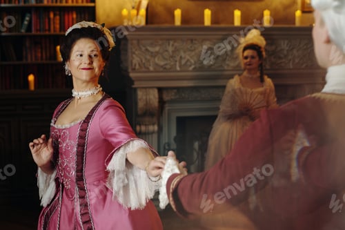Preview: Middle Aged Caucasian Woman Dancing with Man in Baroque Renaissance Setting