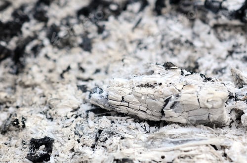 Preview: Pile of ashes after the fire went out grunge background texture